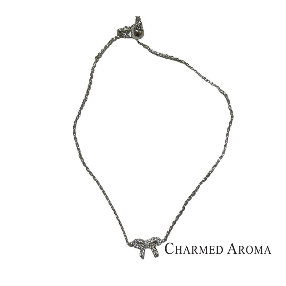 Charmed Aroma Adjustable  Bow Bracelet